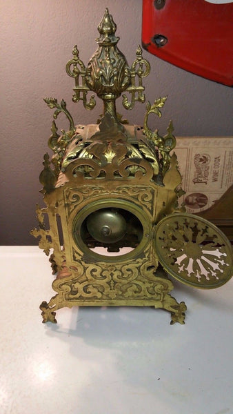 Ornate Brass Antique Mantle Clock w/ Chime Bell Decorated w/ a Lions Head