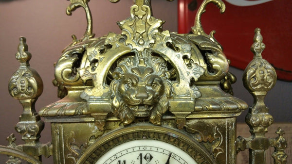 Ornate Brass Antique Mantle Clock w/ Chime Bell Decorated w/ a Lions Head