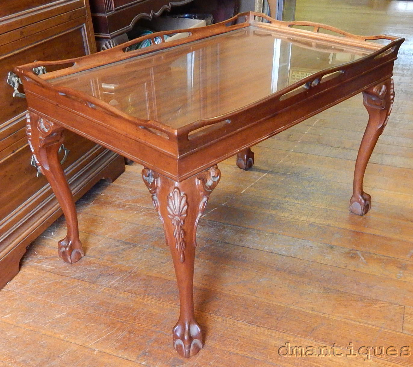 Antique Solid Mahogany Tea Coffee Table with Carved Floral Design and Ball & Claw Foot, and Glass Top Tray.
